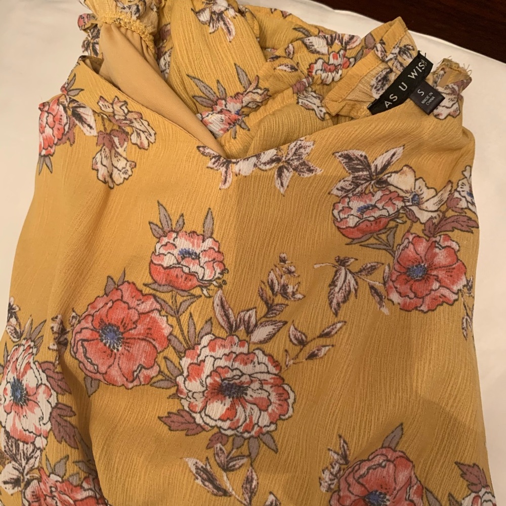 A mustard yellow romper